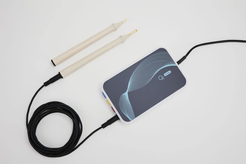 Portable SSD with cables and wooden digital drumsticks