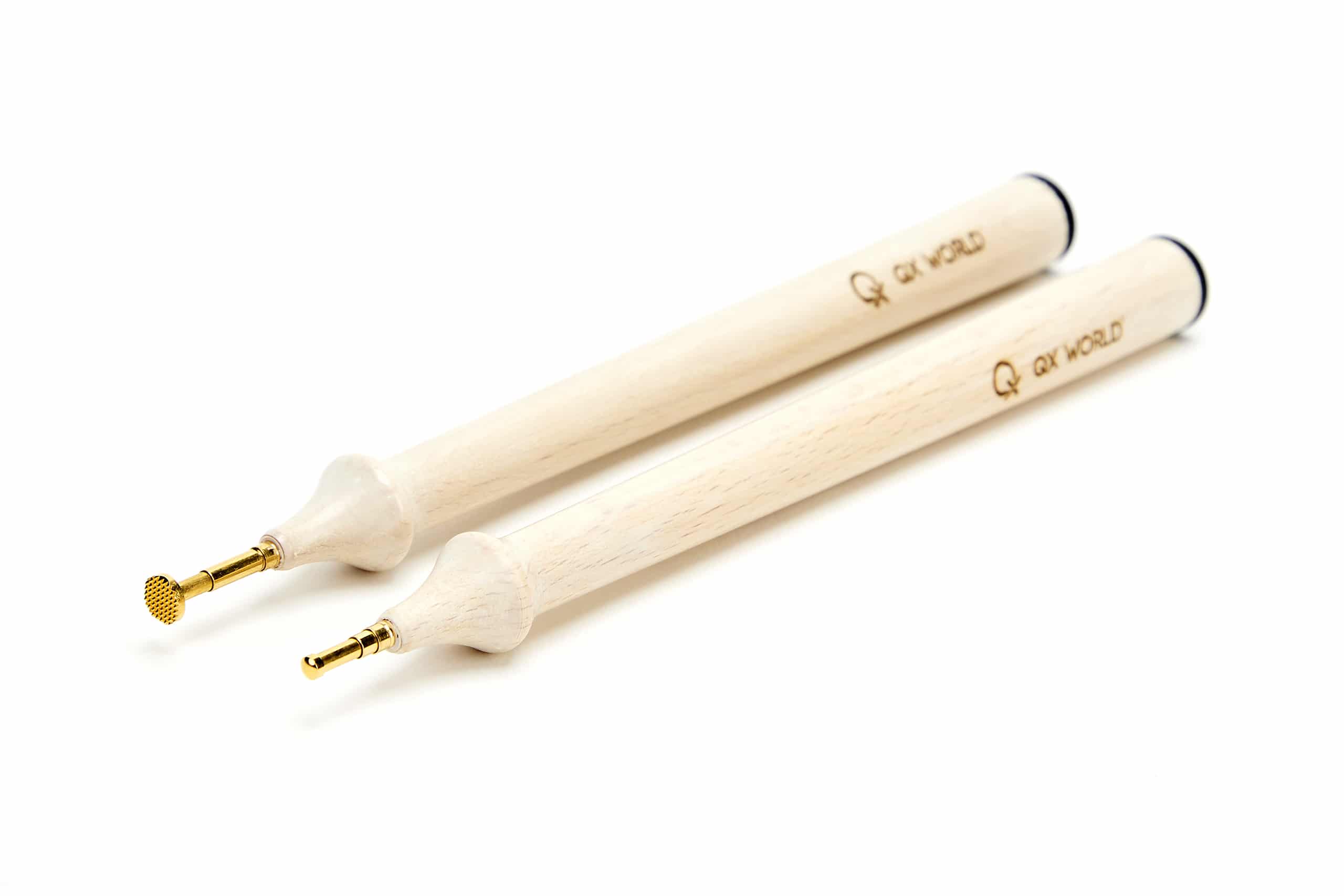 Two branded wooden drumsticks on white background