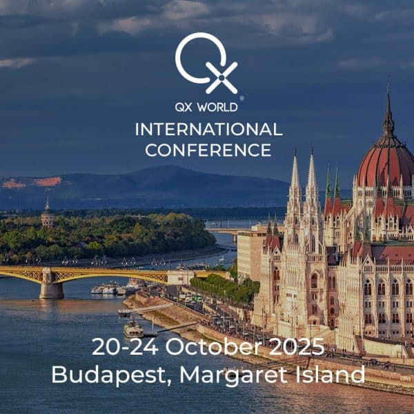 2025 QX World Conference in Budapest with scenic city view